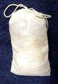 image of muslin bag with herbal mixture and drawstring